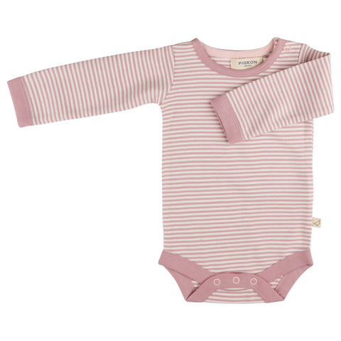 Pink and white striped baby vest on a white background