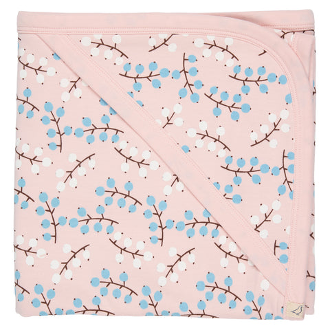 Baby blanket with floral pattern on a pink background