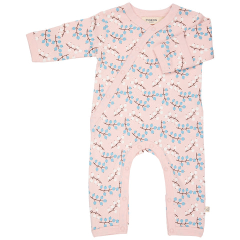 Baby onesie with floral pattern on a white background