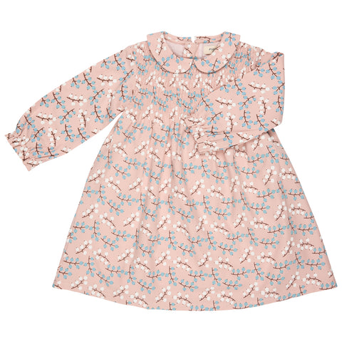 Pink dress with floral pattern on a white background