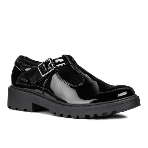A girl's black patent Geox T-bar ballerina shoe with a buckle strap.